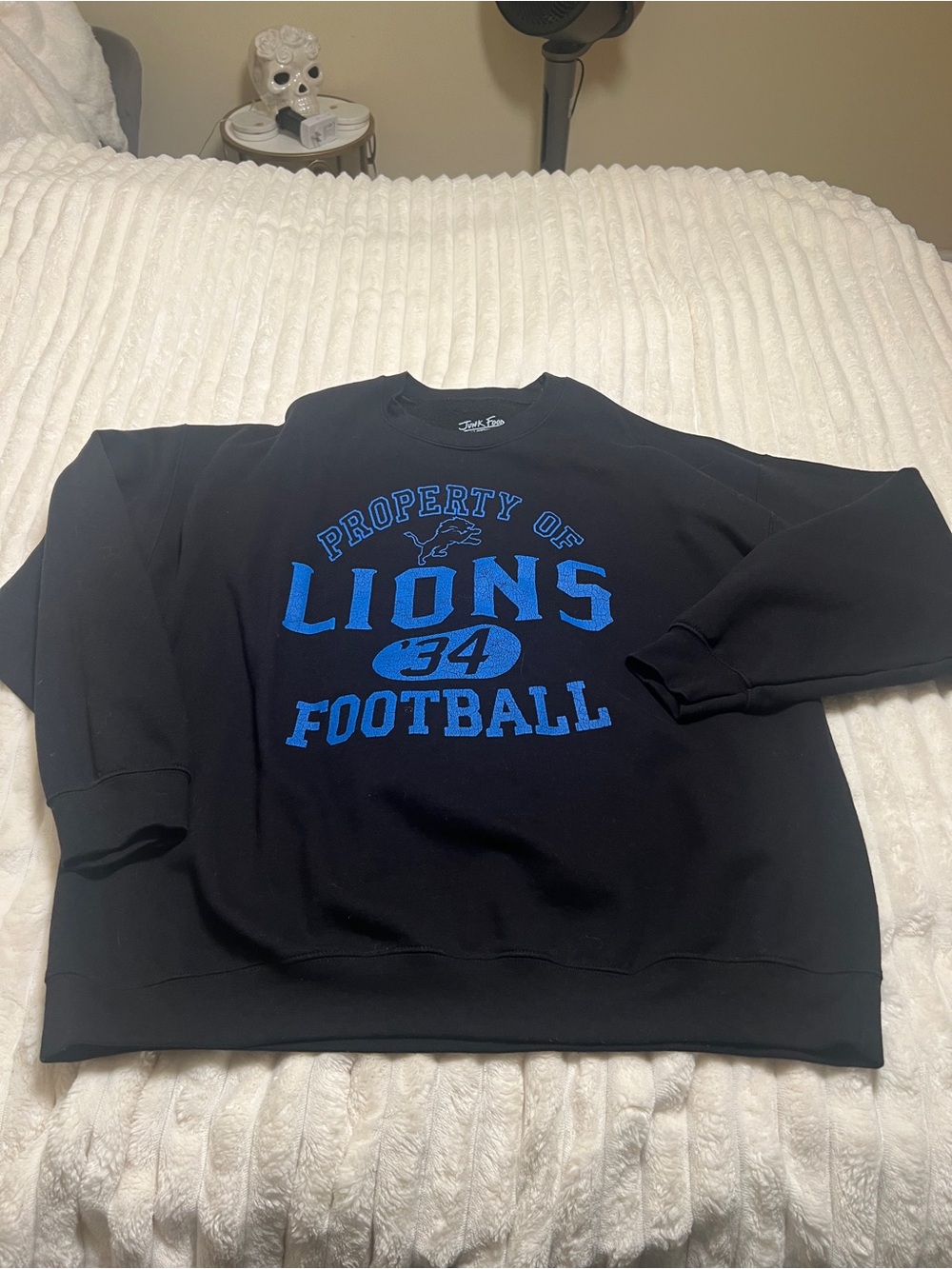 Women’s Black Sweatshirt with Blue 'Lions Football' Graphic